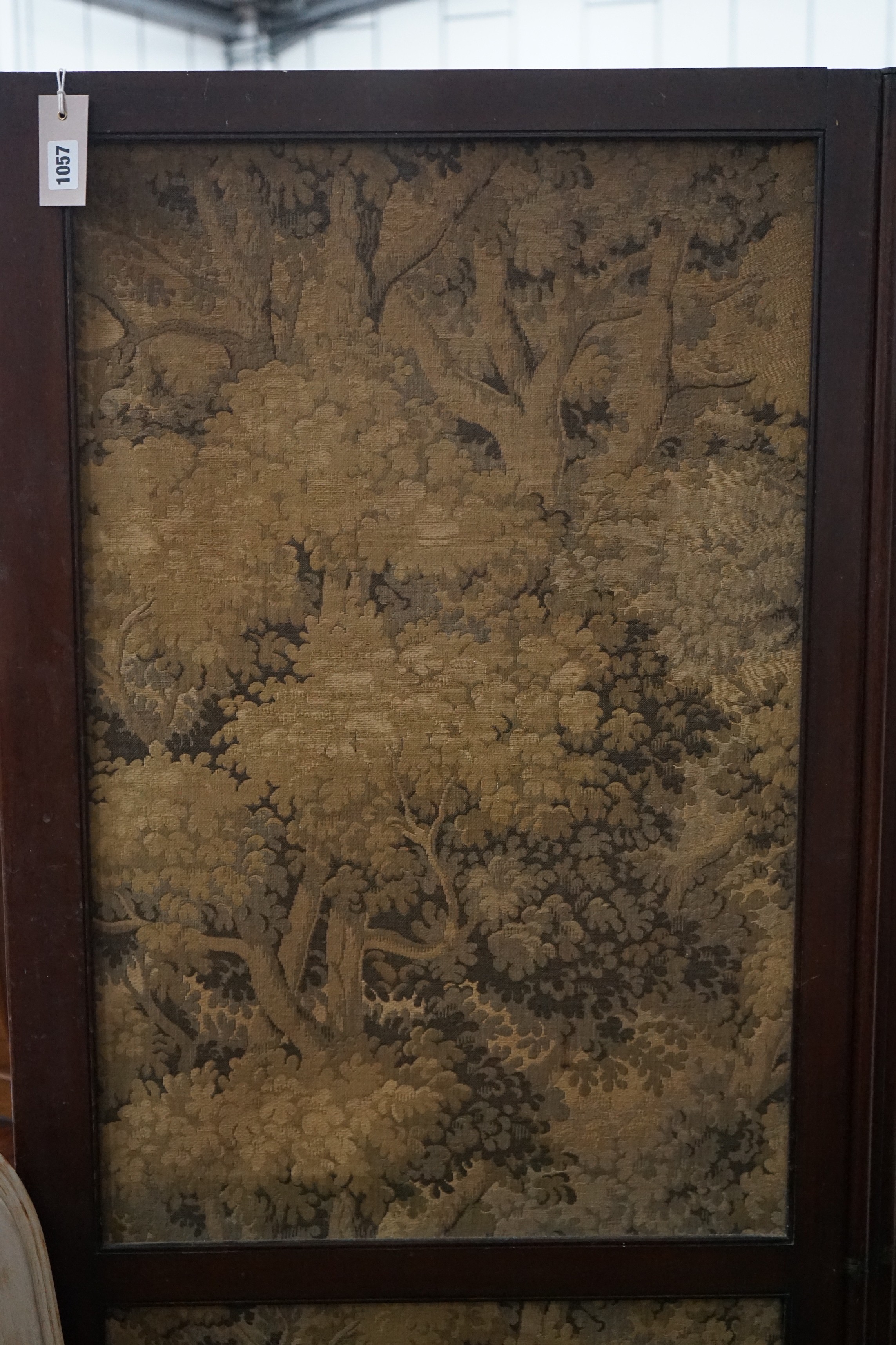 An early 20th century mahogany three fold dressing screen inset tapestry panels, each panel width 62cm, height 168cm